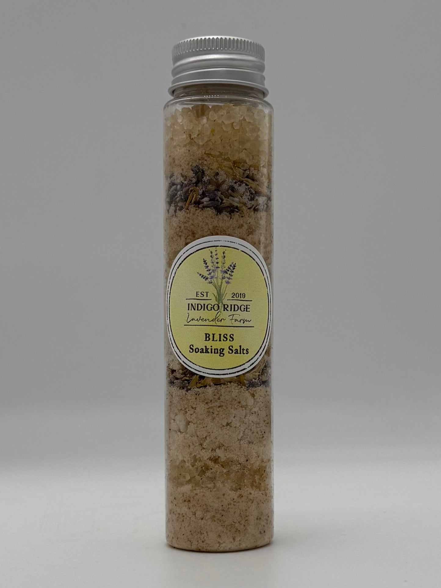 Bottle of Indigo Ridge Bliss Soaking Salts on a white background