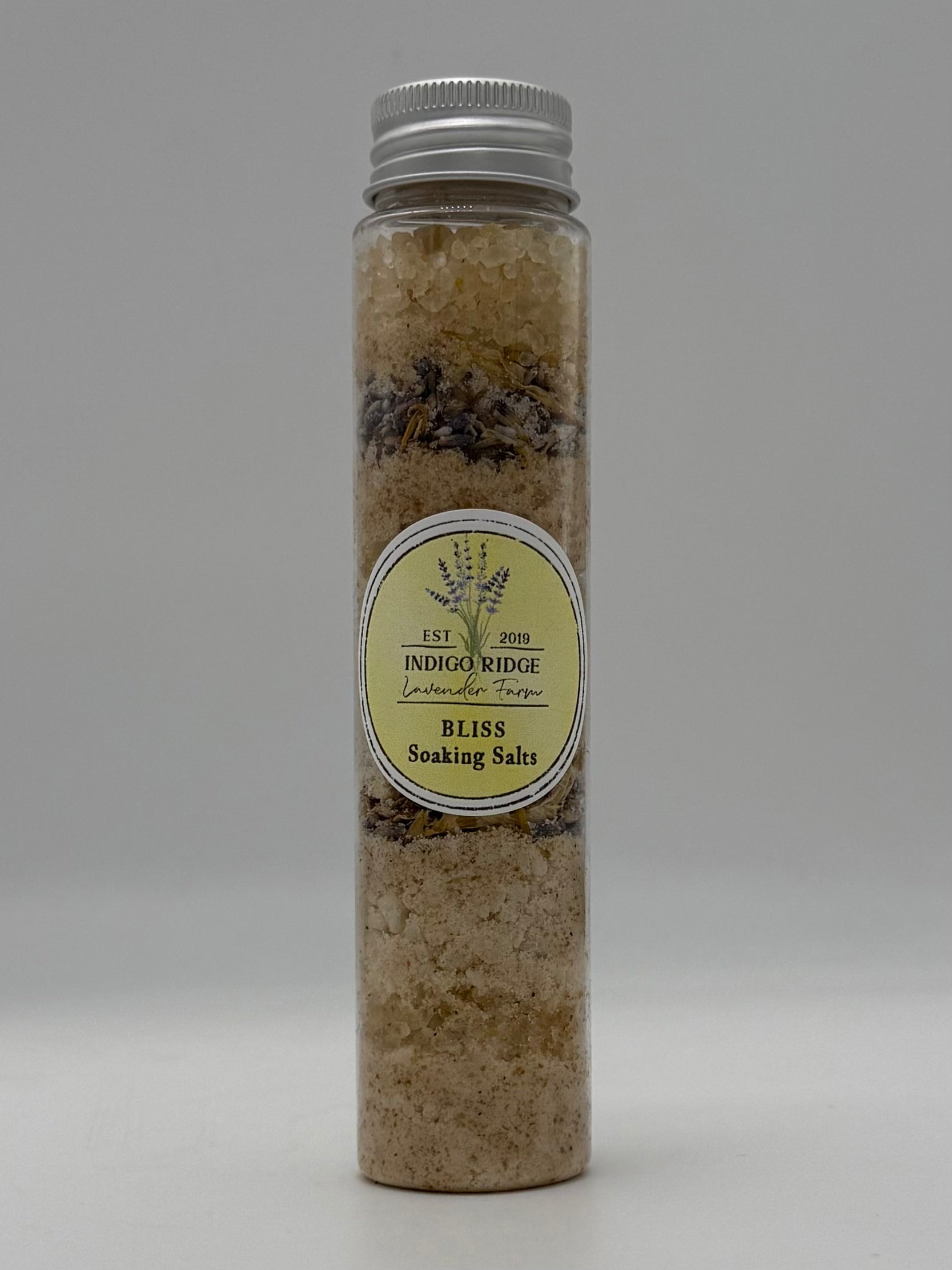 Bottle of Indigo Ridge Bliss Soaking Salts on a white background
