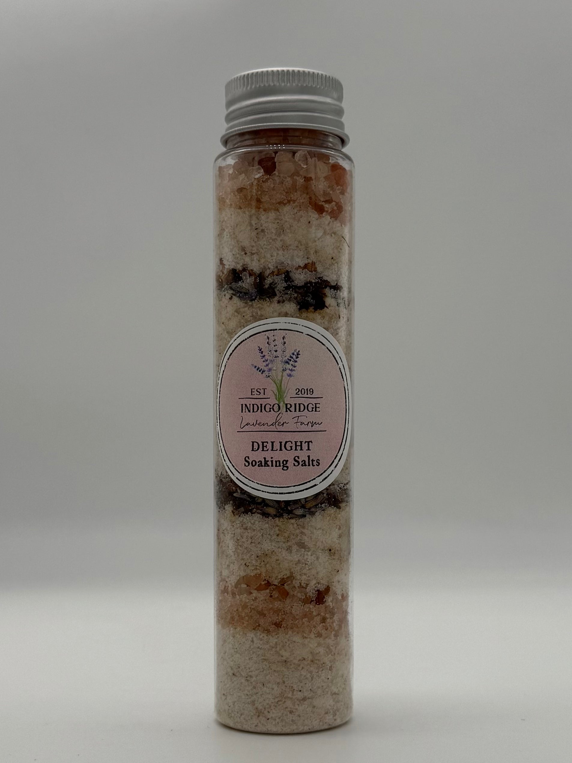 Bottle of Indigo Ridge Delight Soaking Salts on a white background