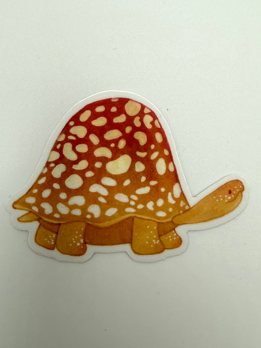 Sticker of a tortoise with a spotted shell on a white background