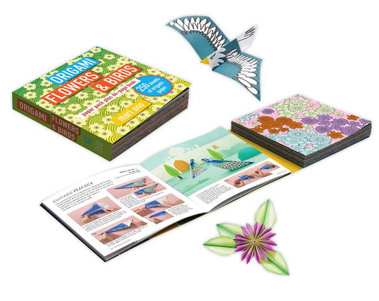 Origami book with instructions and folded paper models on a white background
